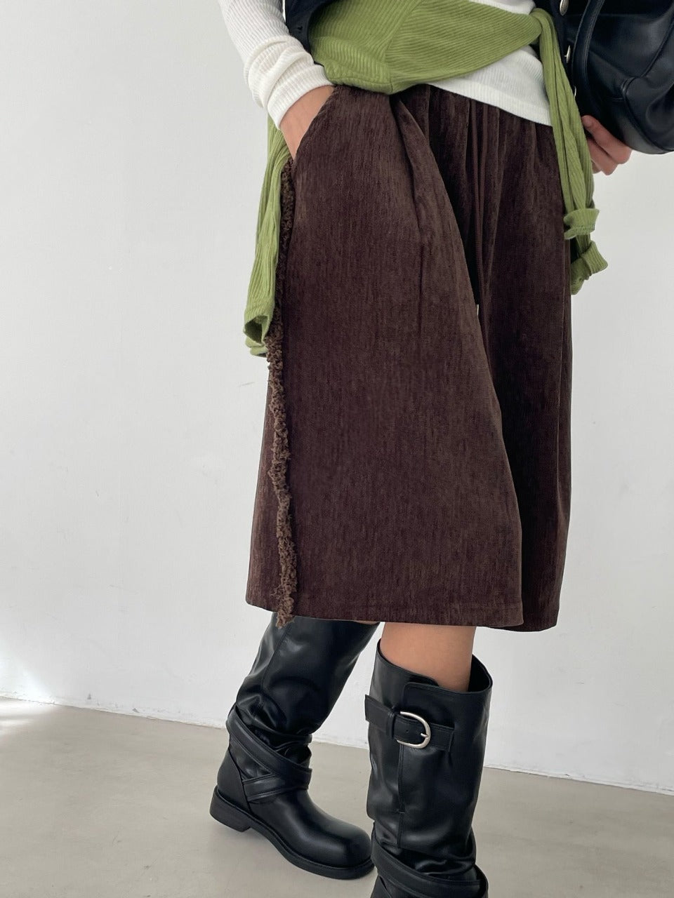 Wide-Leg Tassel Shorts Brown side tassel trim close-up