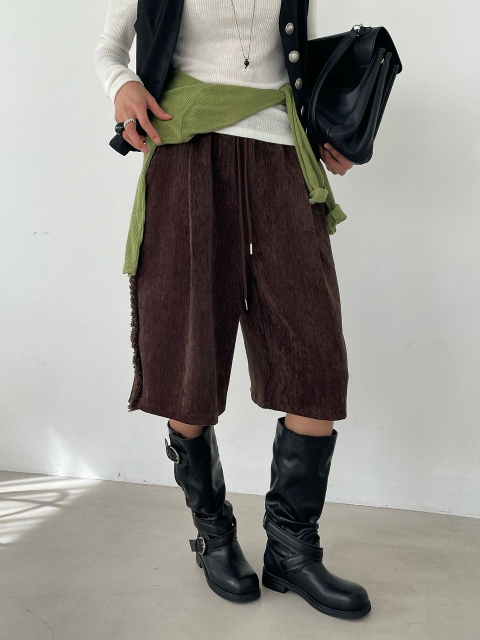 Wide-Leg Tassel Shorts Light Beige side view styled with boots