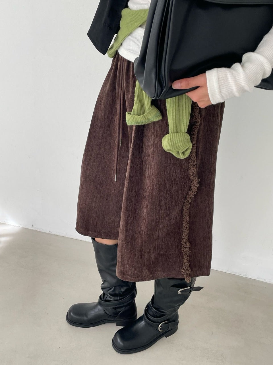 Wide-Leg Tassel Shorts Brown front view styled with boots