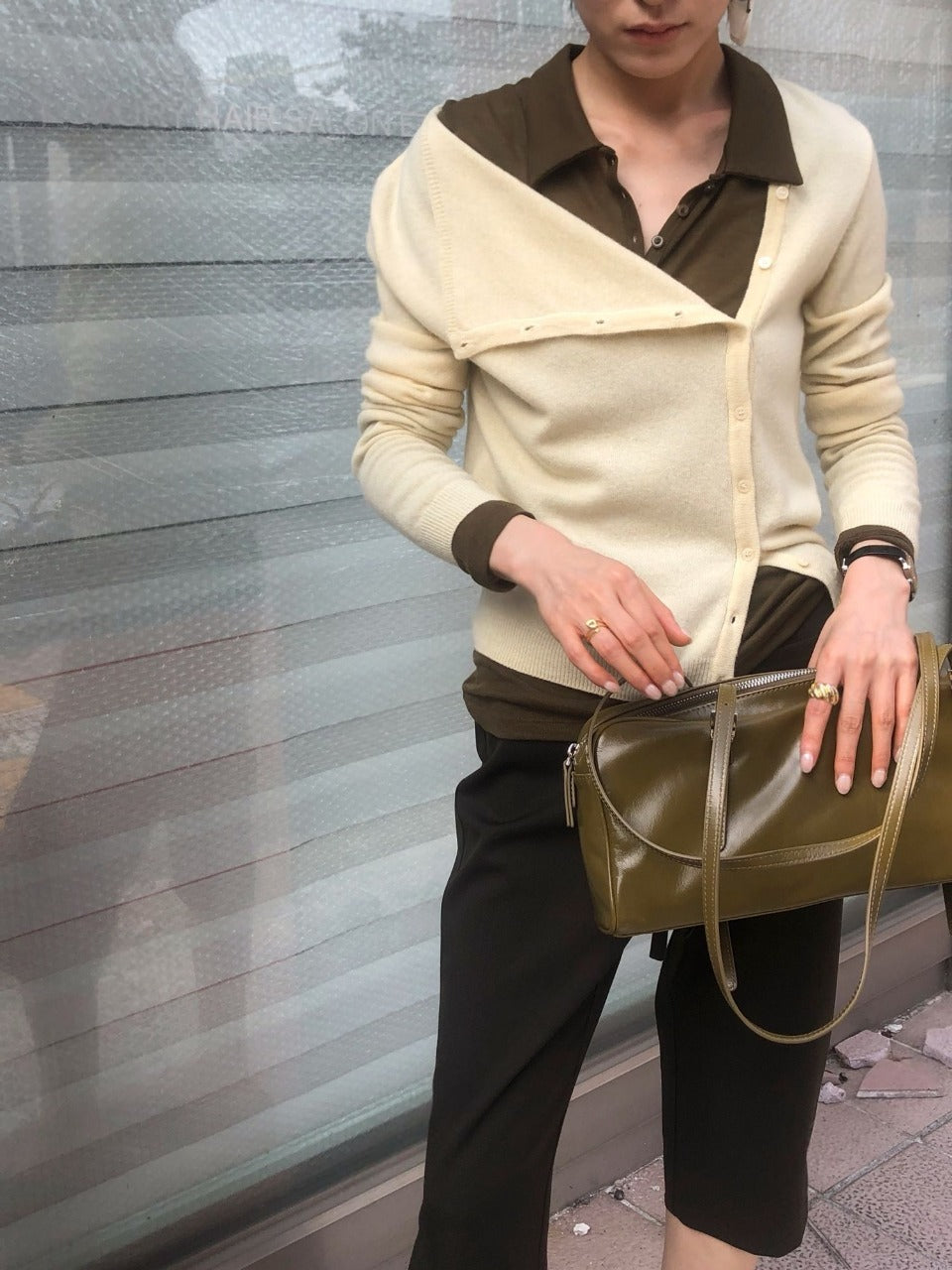 Light yellow asymmetric button knit cardigan with draped neckline