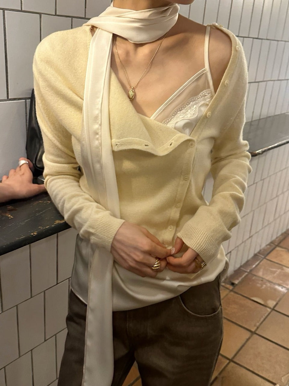 Asymmetric button knit cardigans in light yellow, pink, red, brown, melange gray, and black
