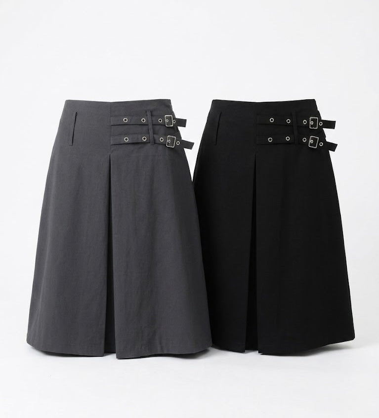 Newol Double Buckle Eyelet Pleated Midi Skirt — Asymmetric Hem