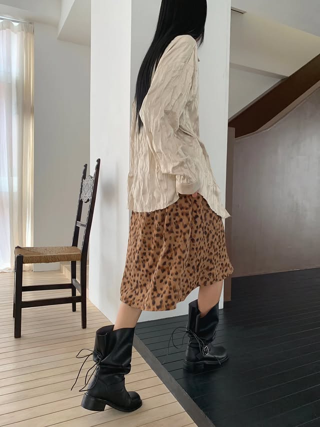 Leopard Print Midi Skirt Ivory close-up front styled