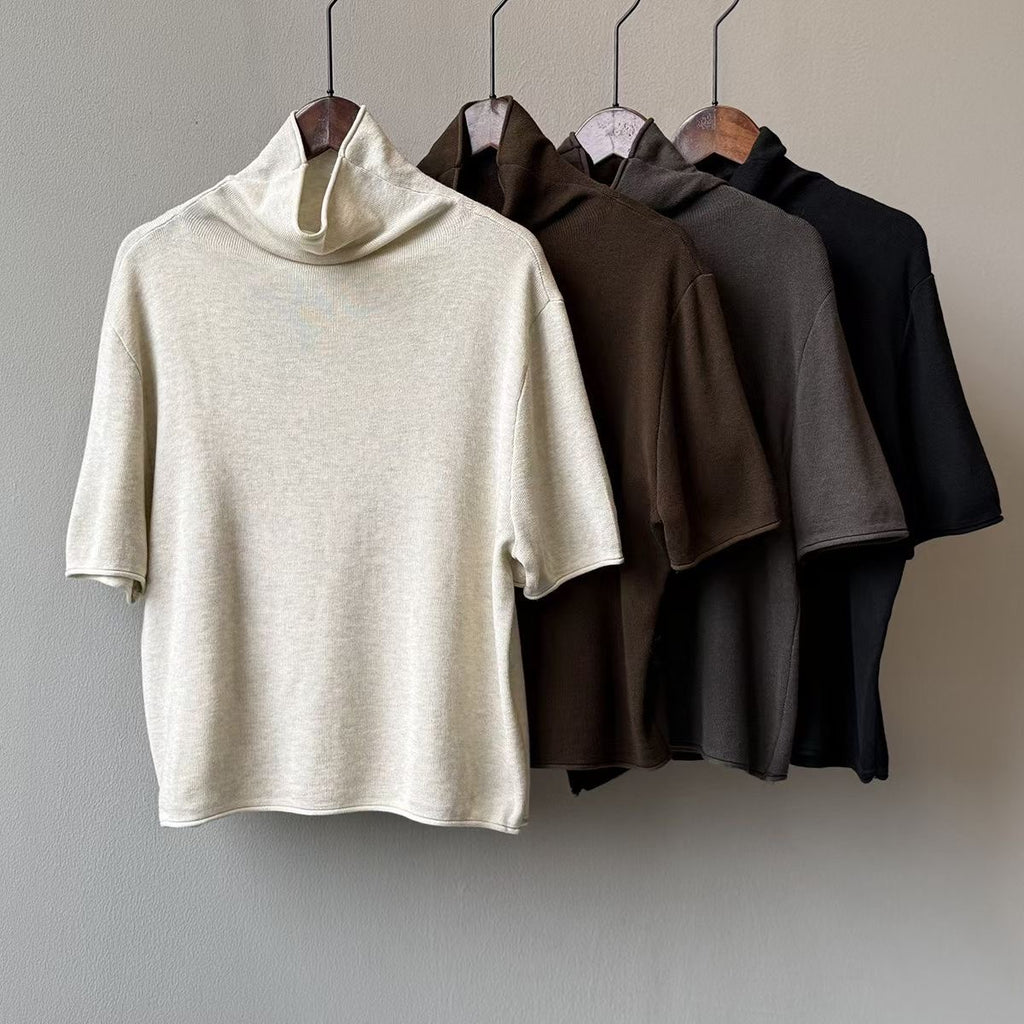Front view of a brown knit top showing its mock neckline and short sleeves.