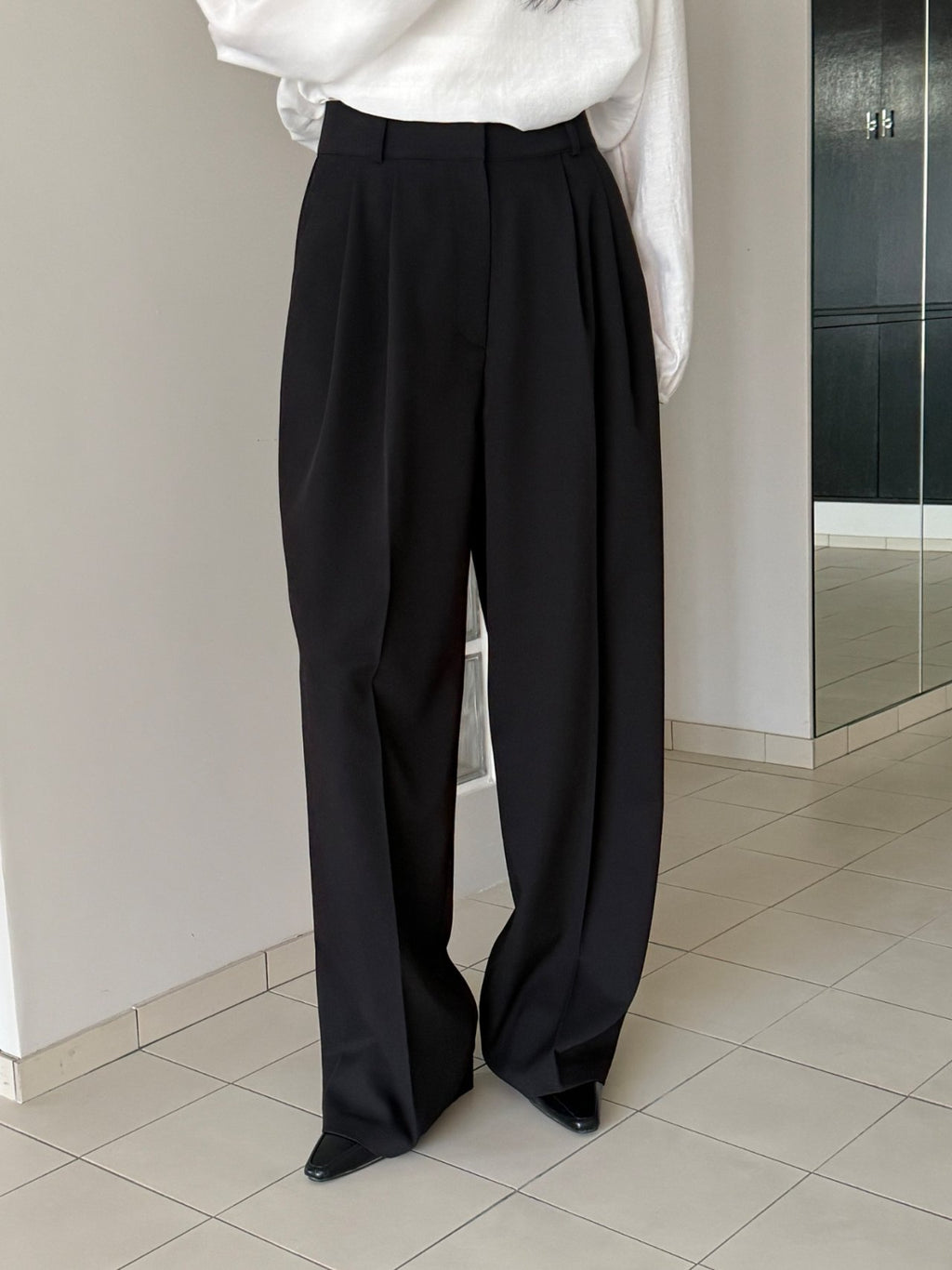 Pantaloni ampi a pieghe