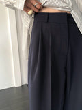 Pantaloni ampi a pieghe