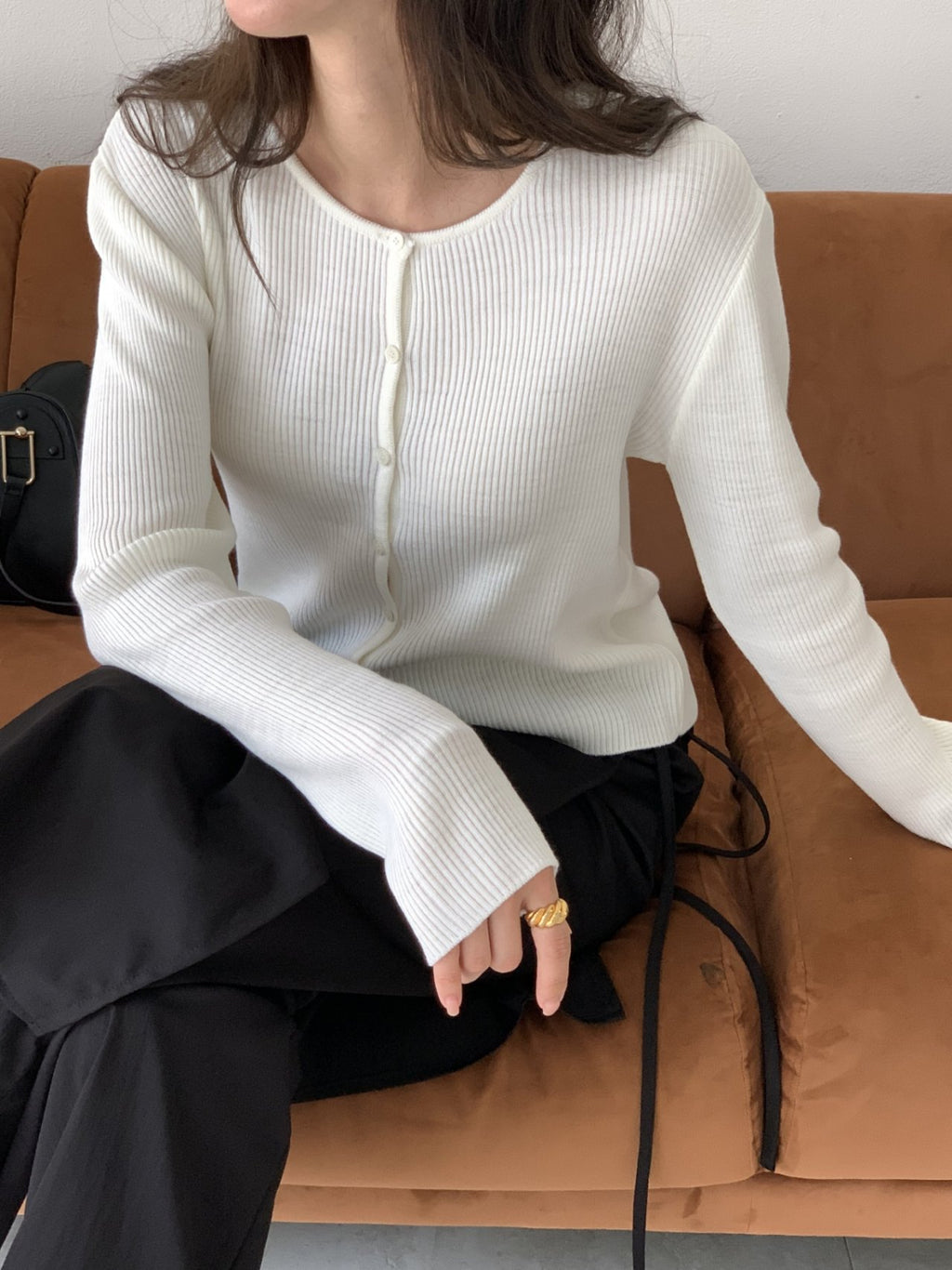 Top in maglia a costine con bottoni