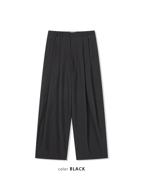 pinstripe double pleat wide leg pants in Black, back welt pocket close-up