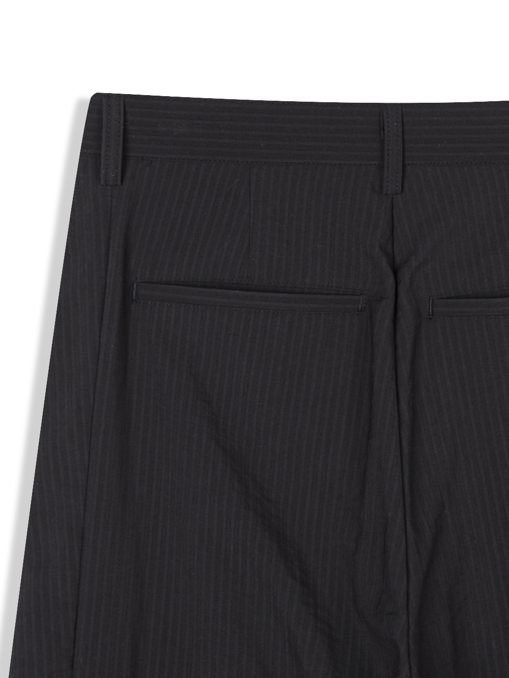 Act pinstripe double pleat wide leg pants in Black, front waistband and pleat close-up