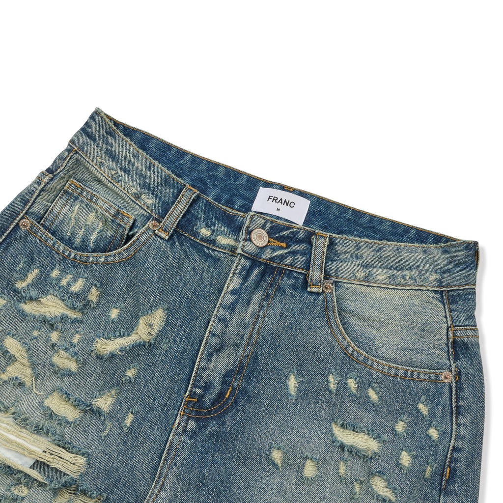 Franc heavy distressed barrel wide leg jeans in Mid Blue, front coin pocket and ripped detail close-up