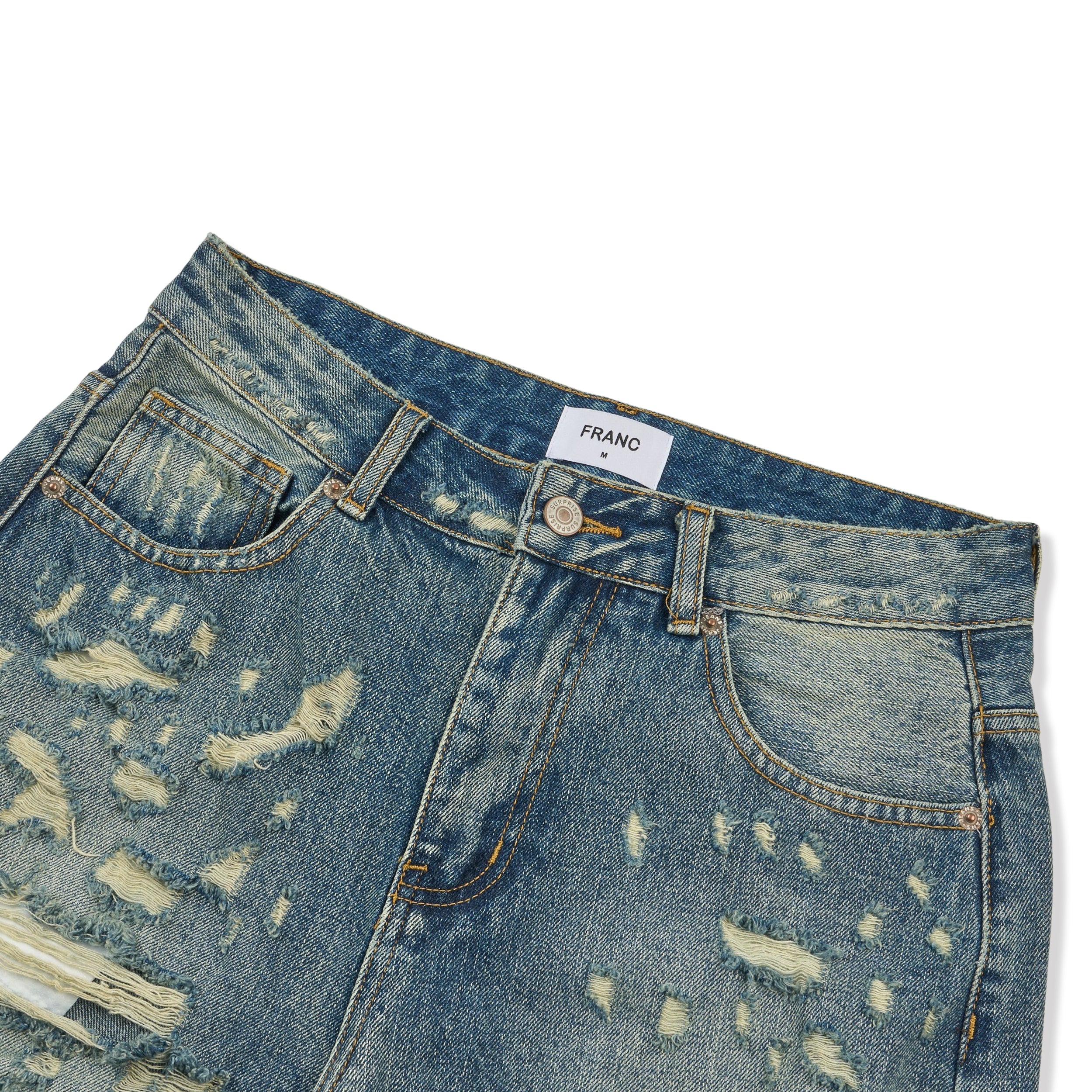 Franc heavy distressed barrel wide leg jeans in Mid Blue, front coin pocket and ripped detail close-up