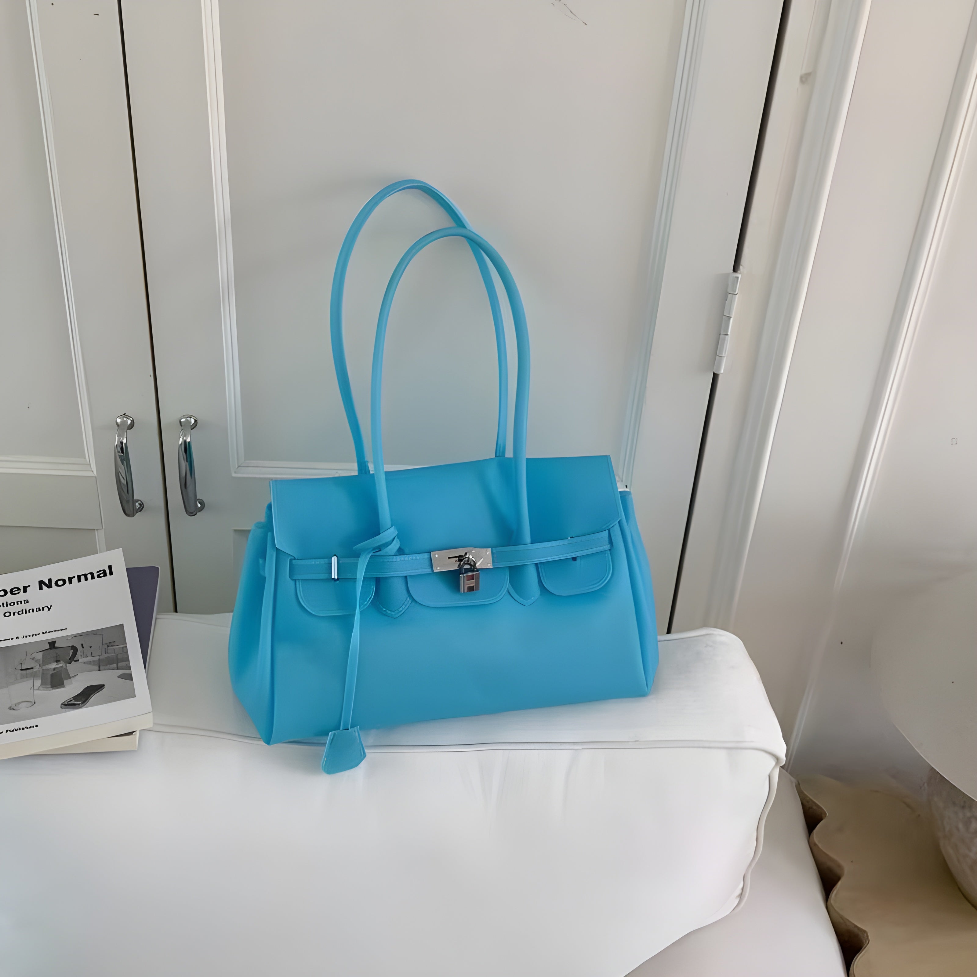 Seoro birkin style square baguette jelly bag in Pink, front view on stool