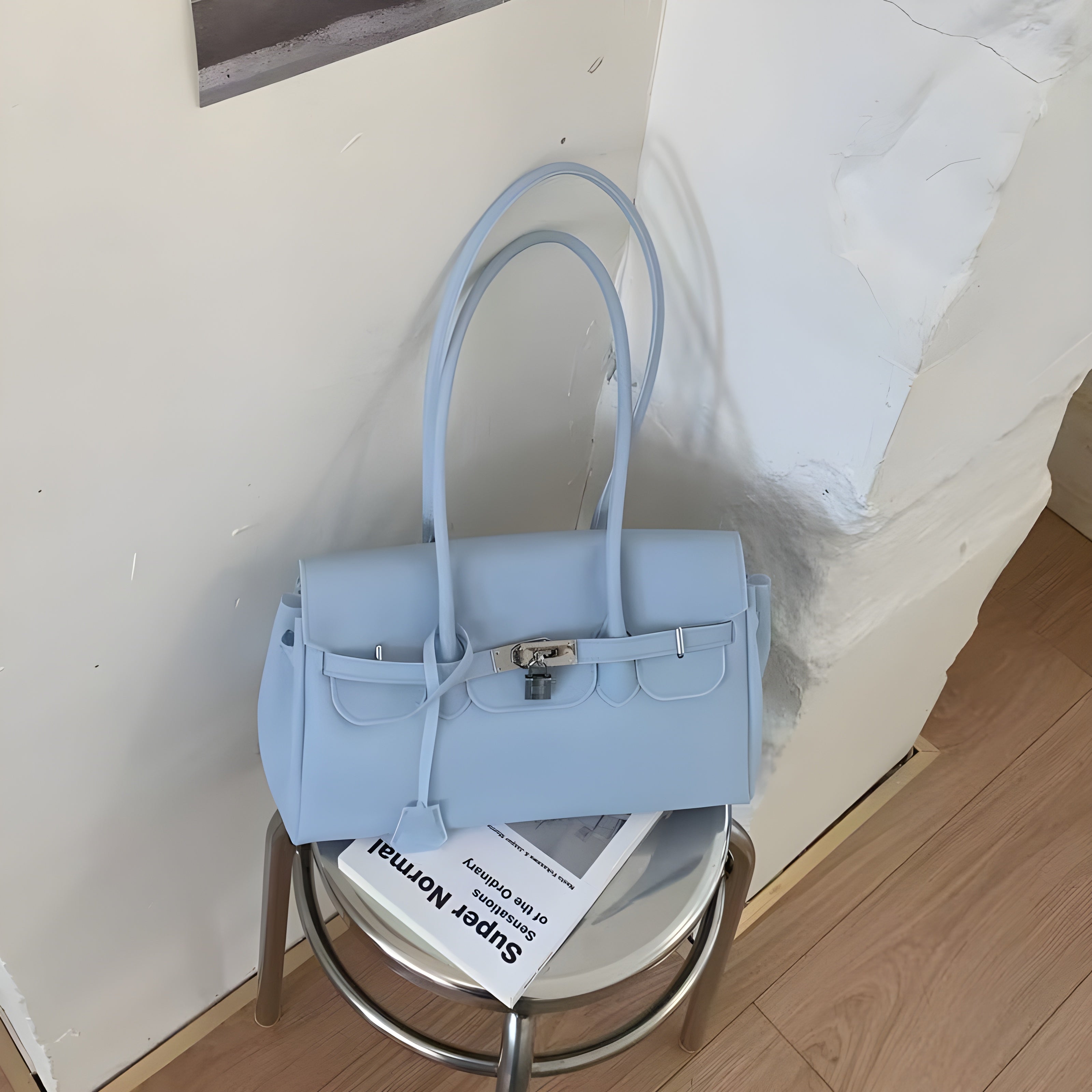 Seoro birkin style square baguette jelly bag in Orange, front view on ottoman
