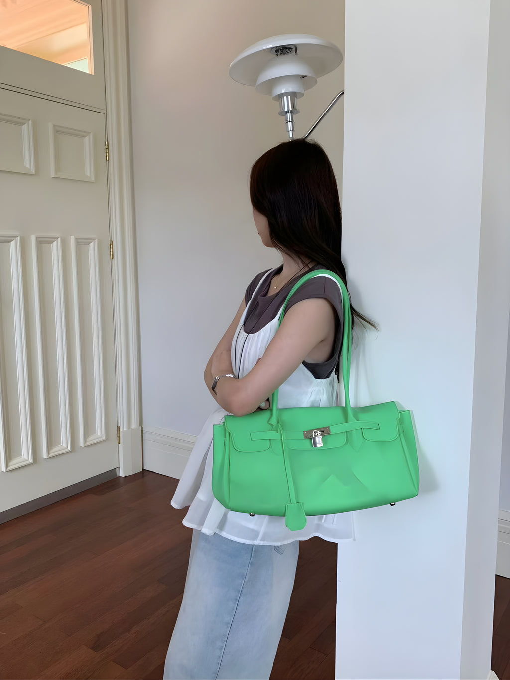 Seoro birkin style baguette jelly bag in Light Yellow, flat lay on chair showing interior and strap detail