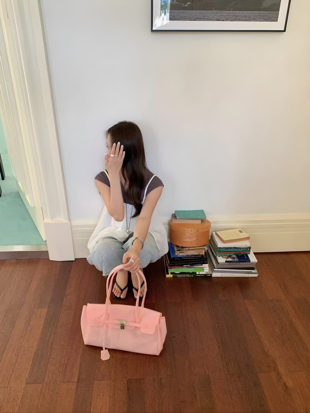 Seoro birkin style baguette jelly bag in White, product shot on chair back view