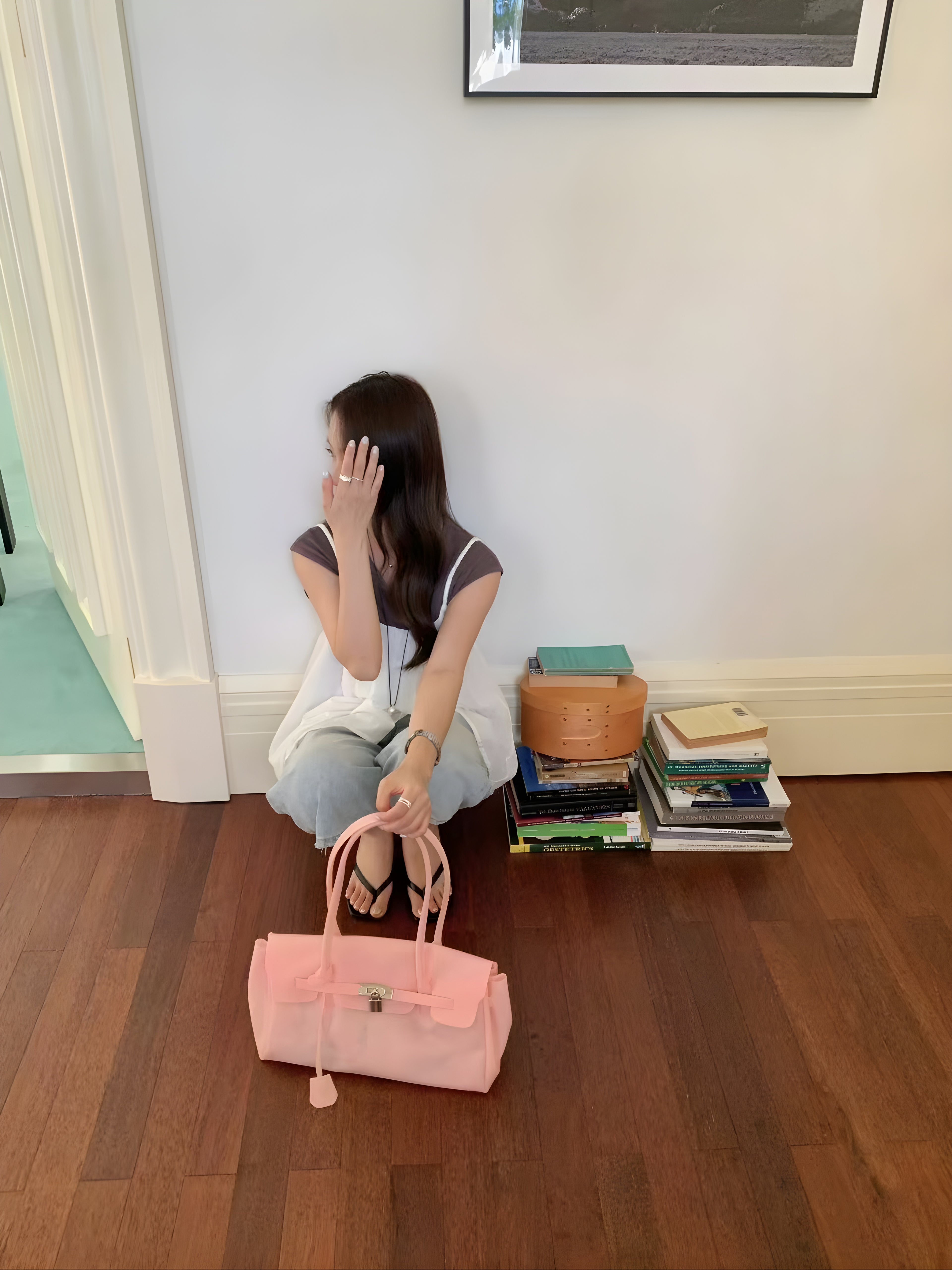 Seoro birkin style baguette jelly bag in White, product shot on chair back view