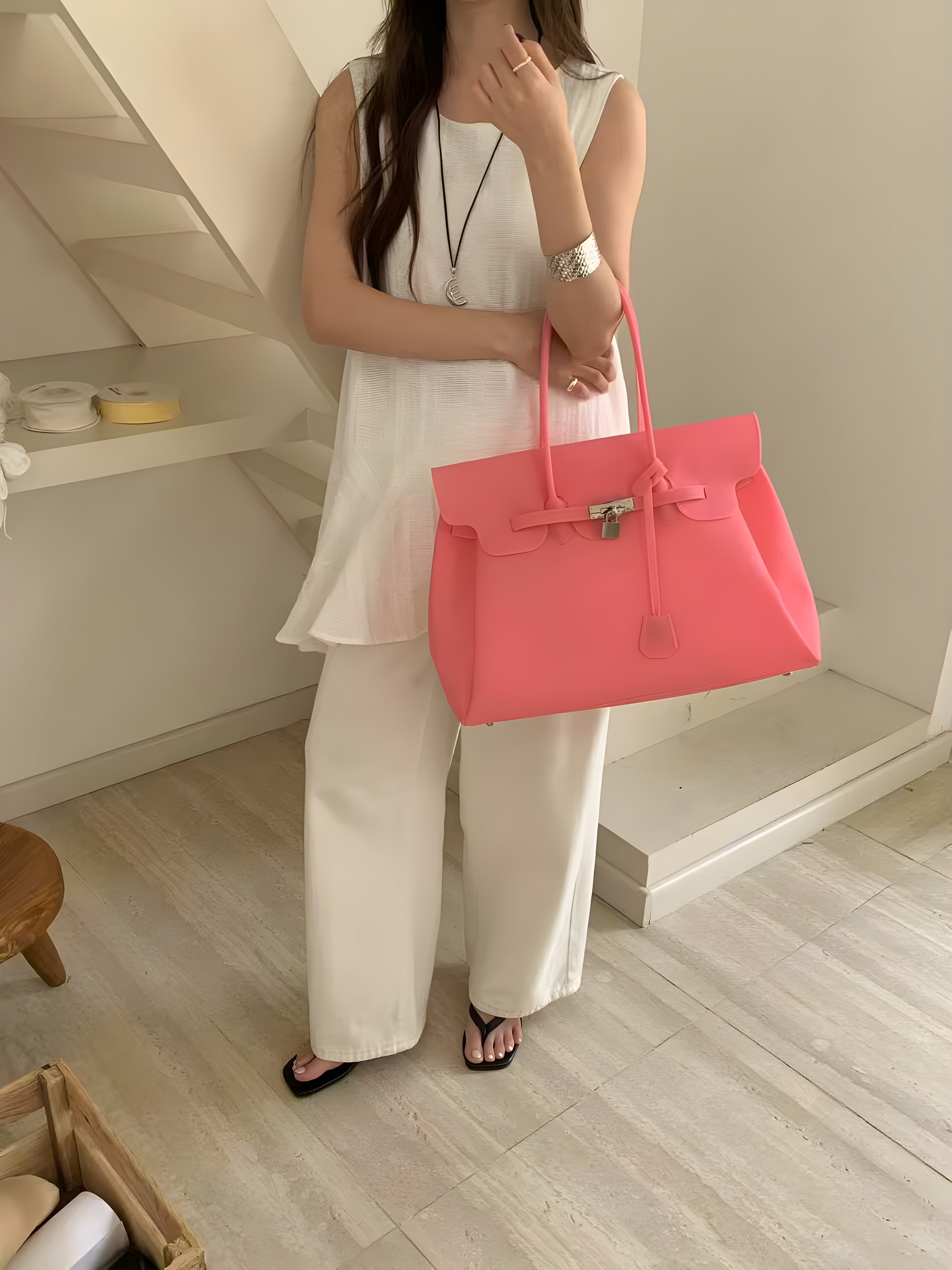 Birkin style large jelly tote bag in Black, styled on model back view