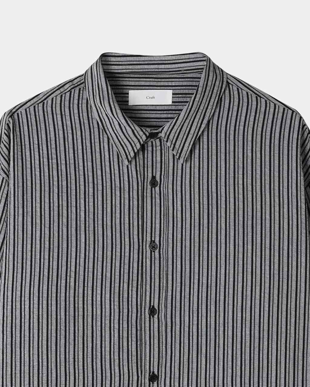 Black men's pinstripe shirt sleeve and buttoned cuff detail