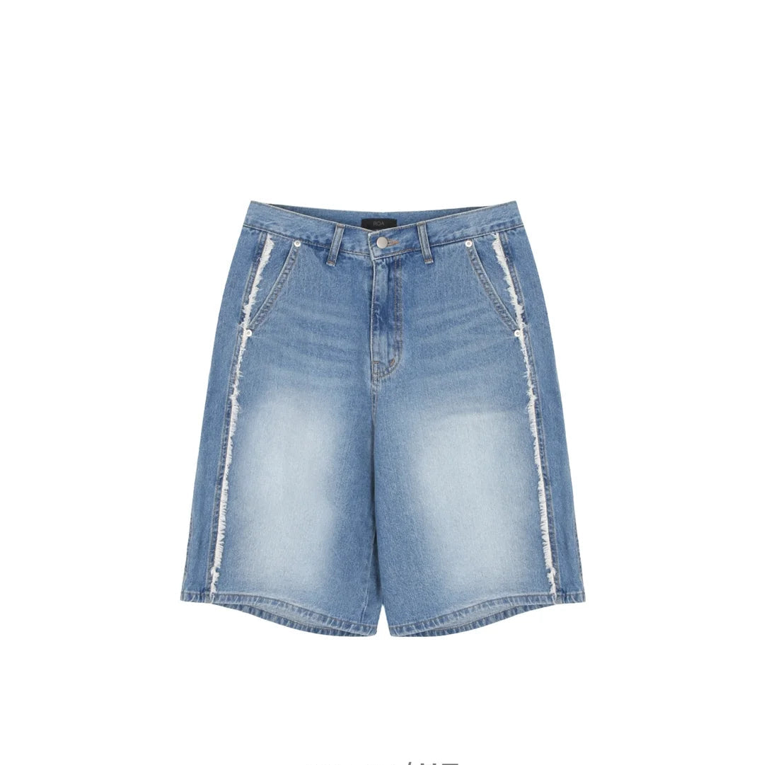 Roa frayed side panel denim shorts in Blue, frayed hem detail close-up