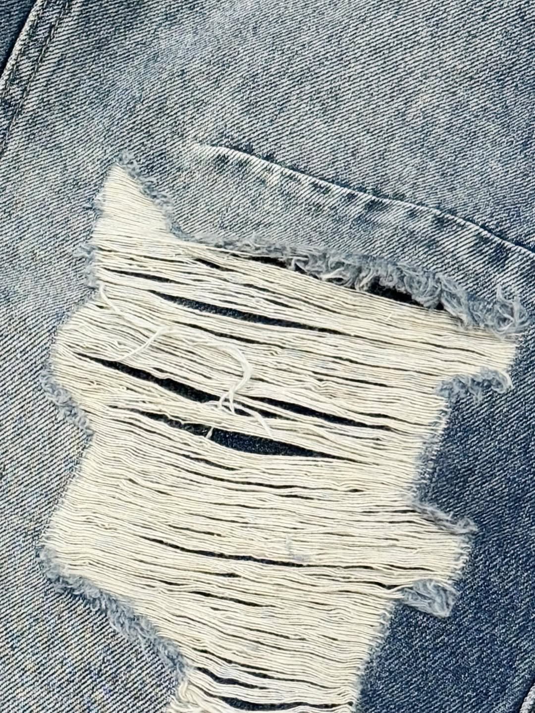 Pantaloni Larghi in Denim Carpenter con Strappi Consistenti