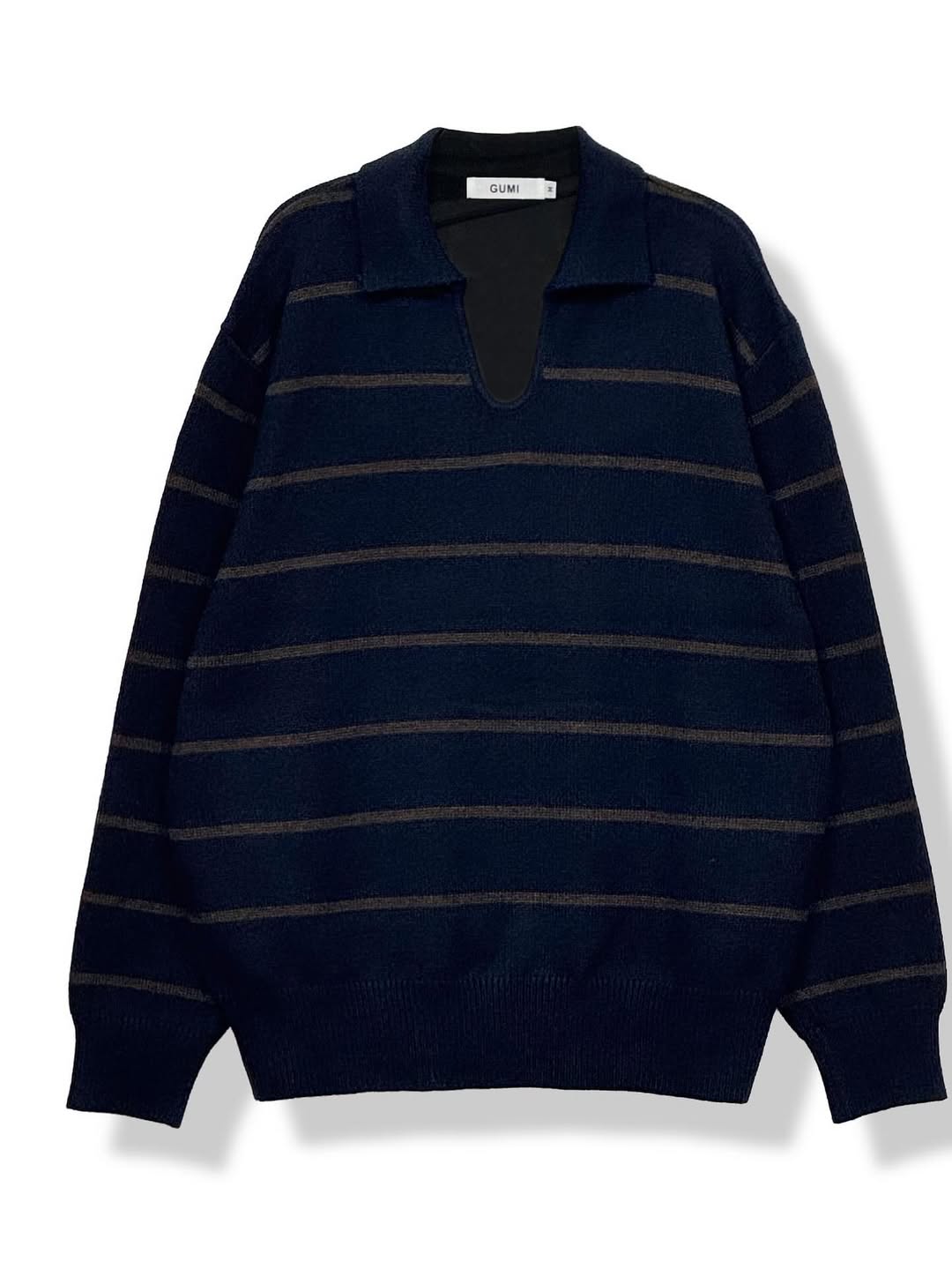 Maglione in maglia a righe di lana con scollo a V
