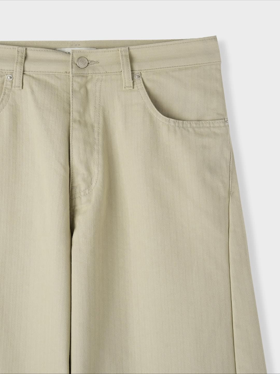 Pantaloni ampi in denim curvi a spina di pesce
