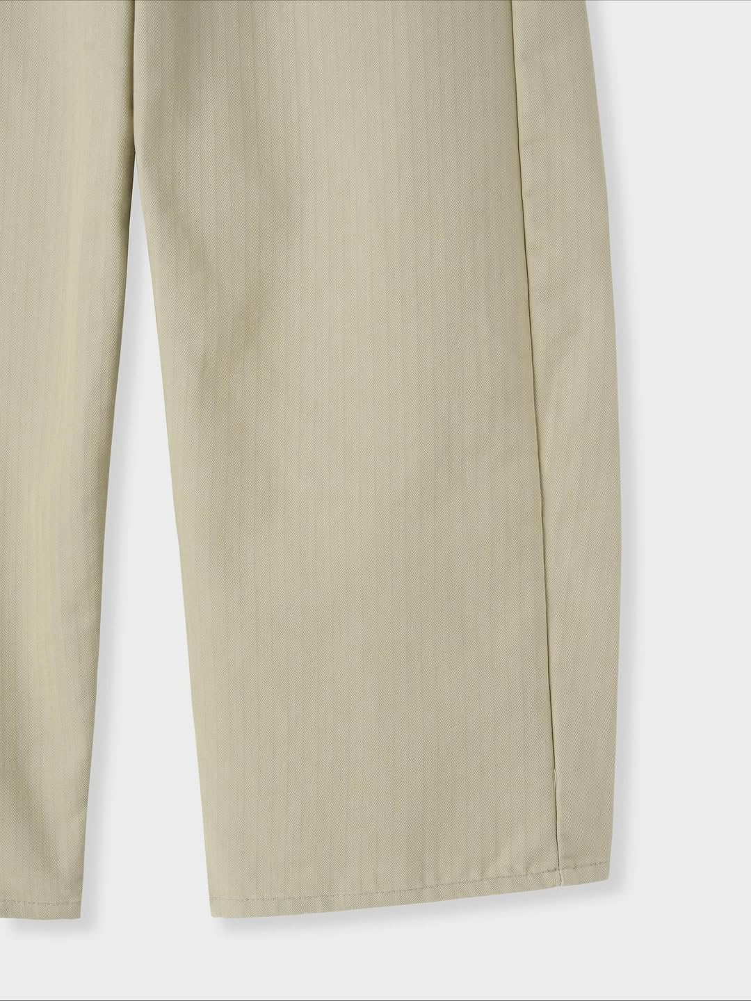 Pantaloni ampi in denim curvi a spina di pesce
