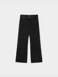Jeans in denim neri svasati con orlo effetto "grinder"