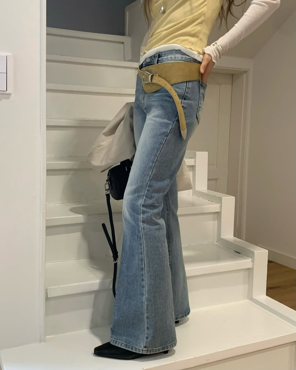 Pantaloni in denim svasati a vita media