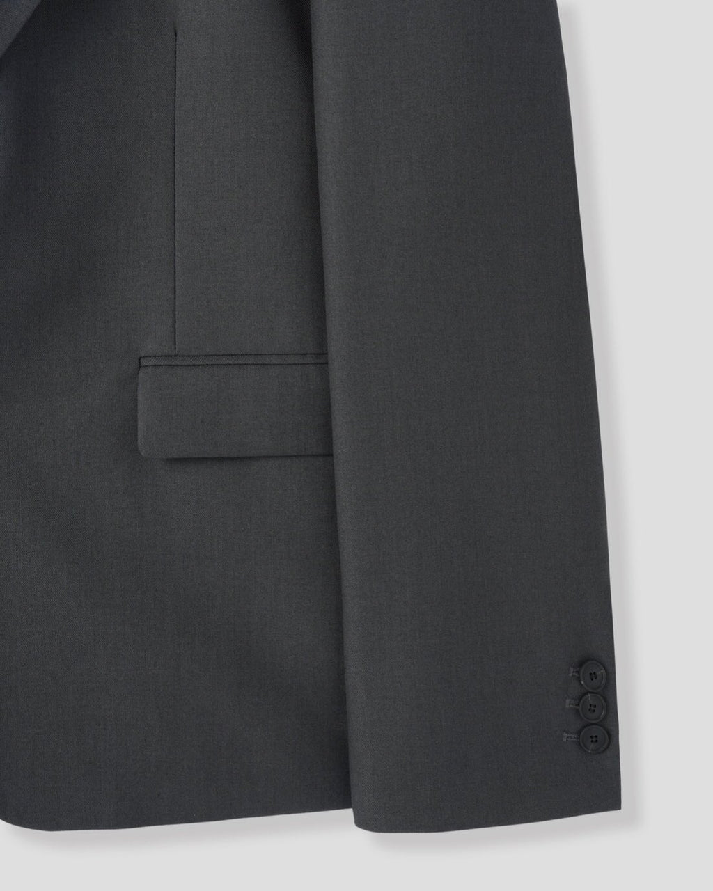 Corkage oversized single button blazer in Charcoal and Black, two colorways back view flat lay on grey background