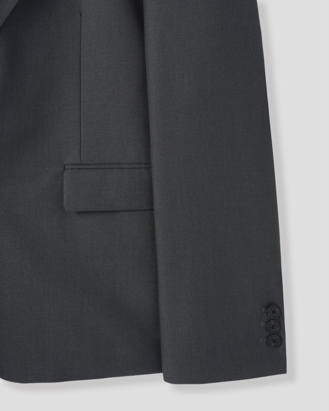 Corkage oversized single button blazer in Charcoal and Black, two colorways back view flat lay on grey background