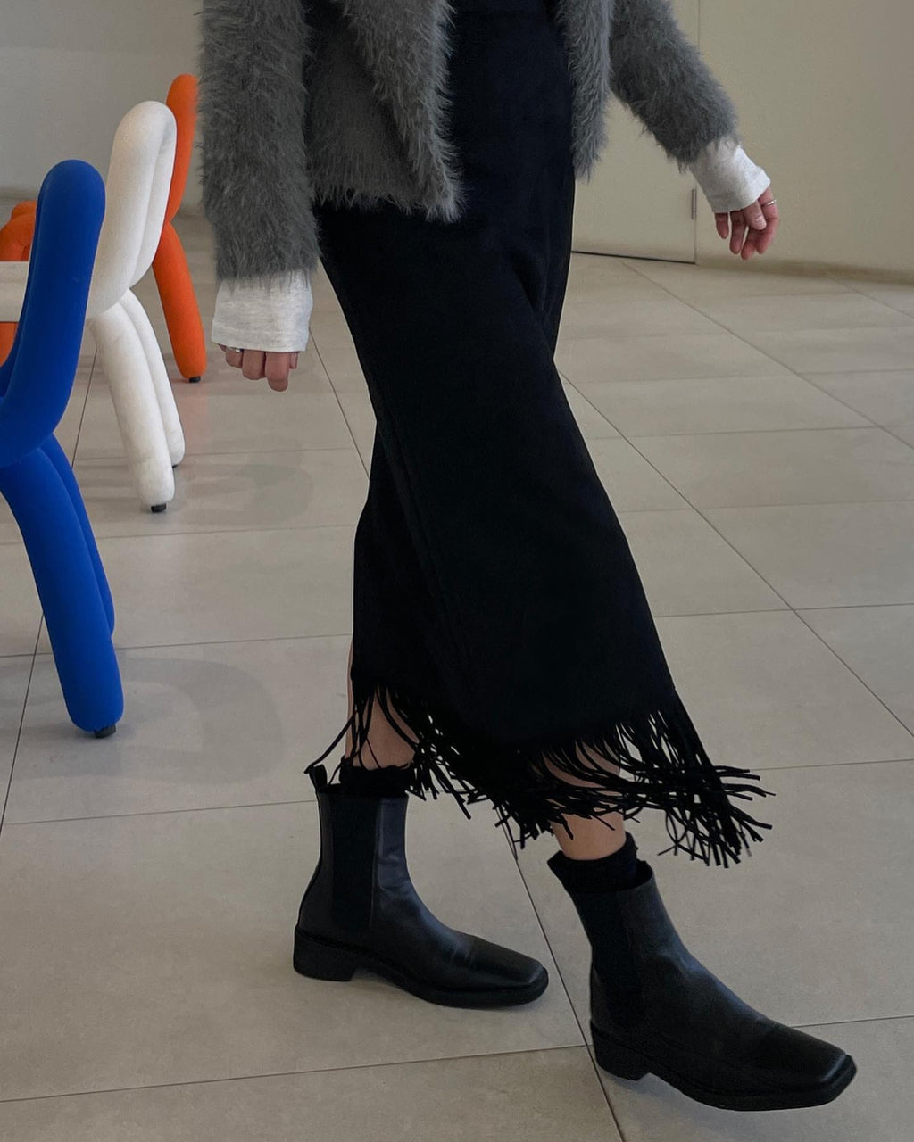 Suede Fringe Midi Skirt Black walking detail