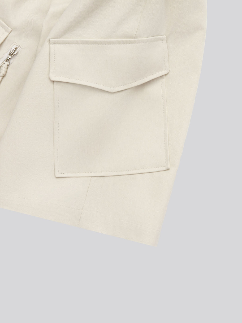 Twill Diagonal Zip Cargo Bermuda Shorts — Brown front