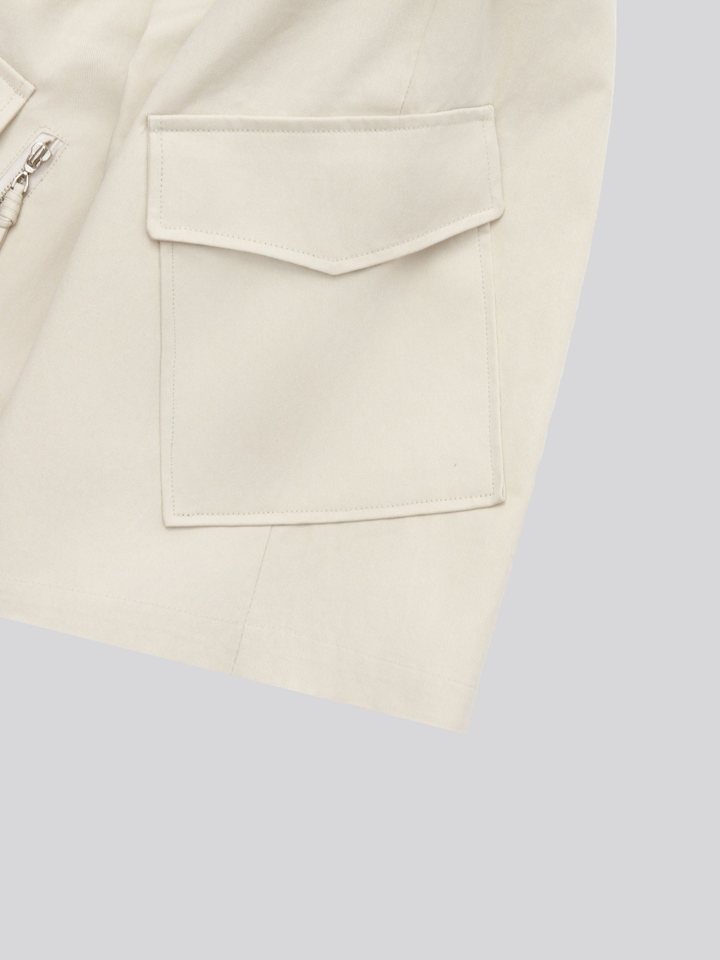 Twill Diagonal Zip Cargo Bermuda Shorts — Brown front
