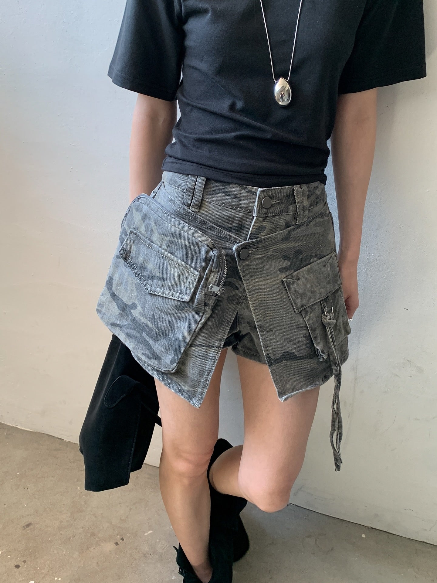 Vive L camo denim skort in Khaki, front view styled with black tee