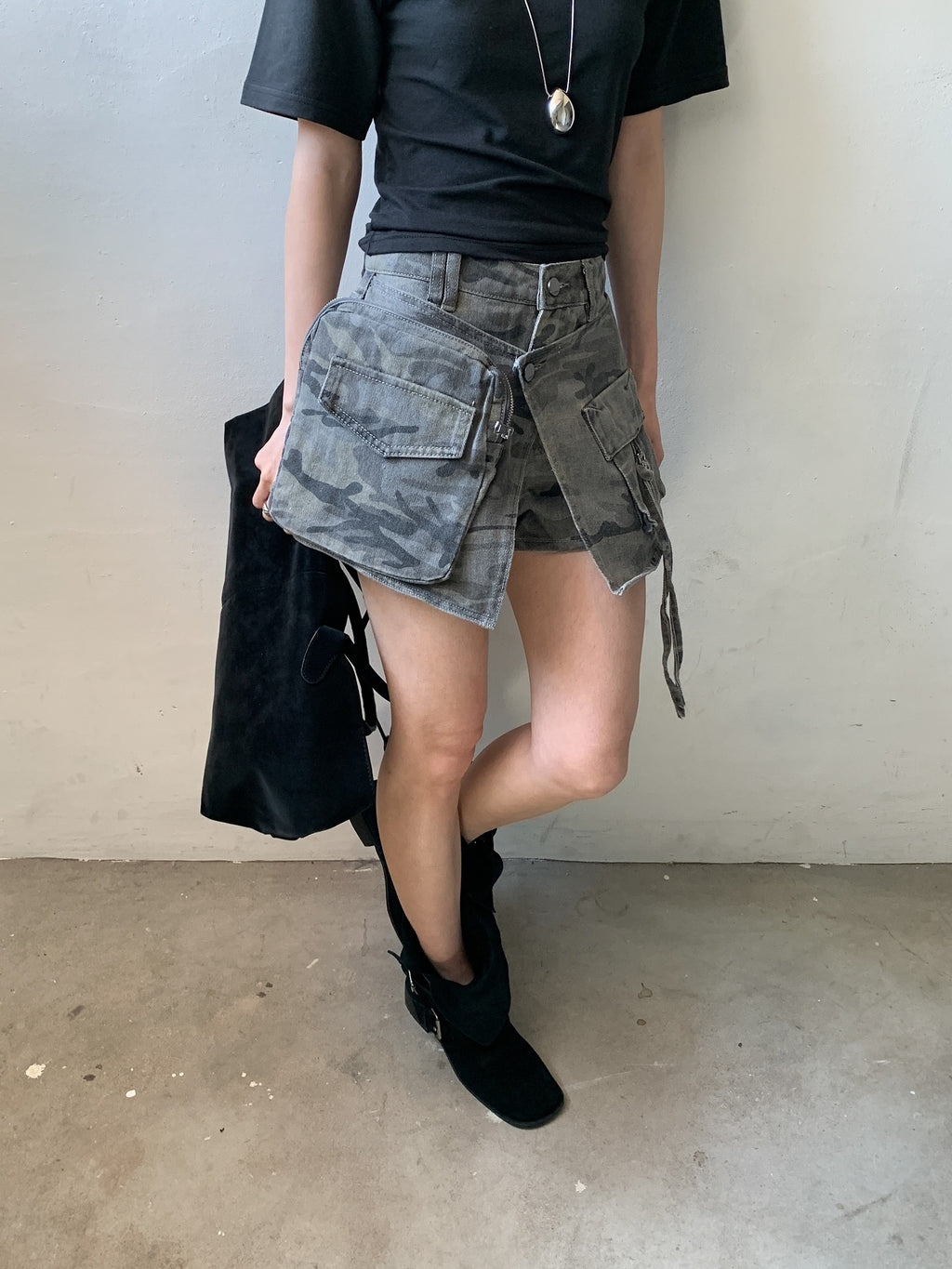 Vive L camo denim skort in Khaki, front view with strap detail