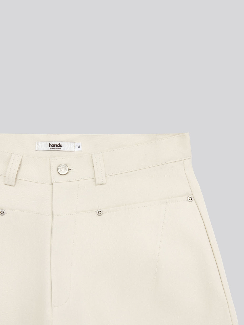 Twill Diagonal Zip Cargo Bermuda Shorts — diagonal zip cargo pocket detail