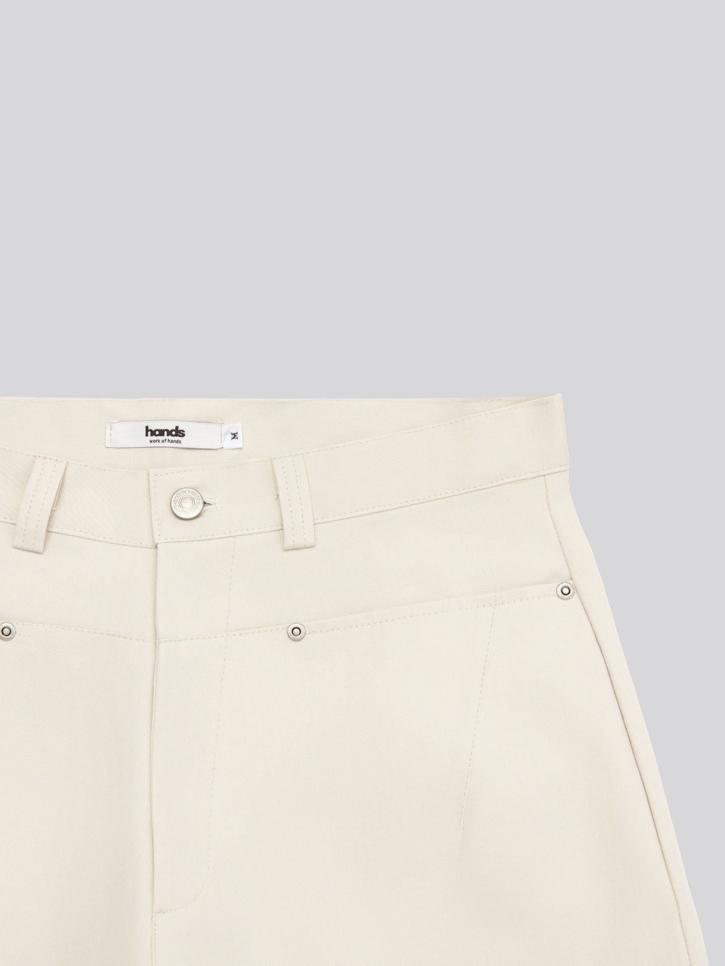 Twill Diagonal Zip Cargo Bermuda Shorts — diagonal zip cargo pocket detail