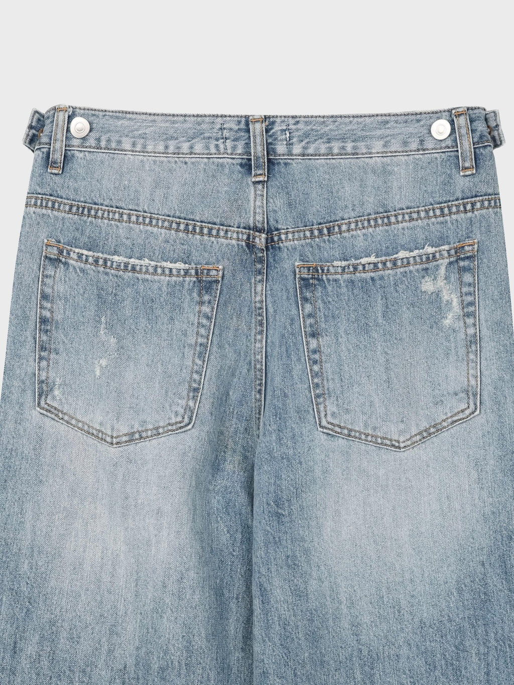 Reber wide leg ripped jeans in light wash, back view close-up pockets
