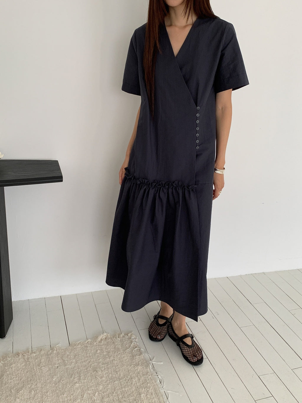 Vivel wrap shirring maxi dress in Charcoal, styled on model front view full length with black mesh Mary Jane shoes