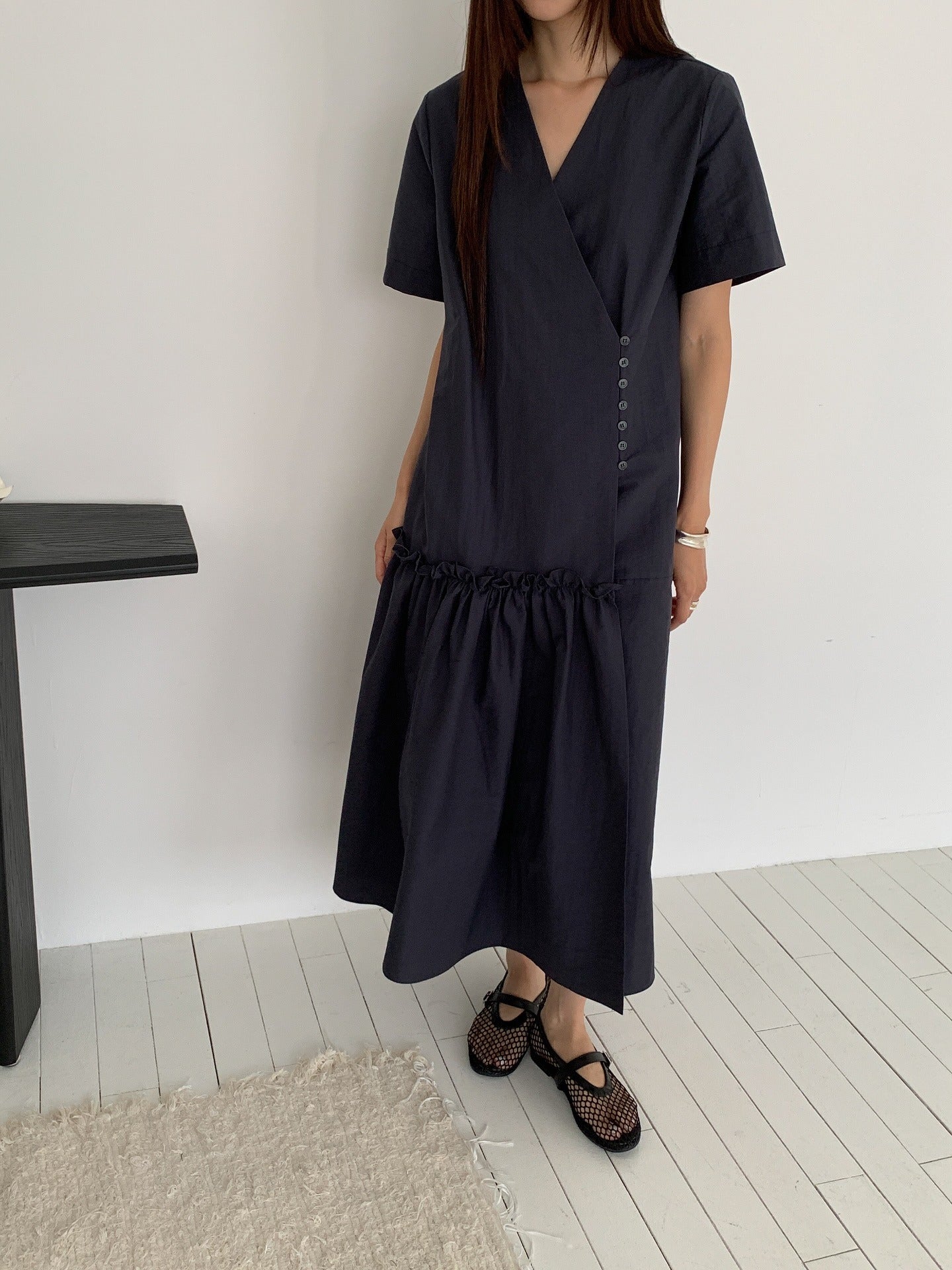 Vivel wrap shirring maxi dress in Charcoal, styled on model front view full length with black mesh Mary Jane shoes