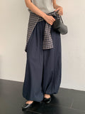 Merrymore drawstring elastic waist harem pants in Black, Navy, Ivory and Burgundy, four colorways product flat lay on grey surface