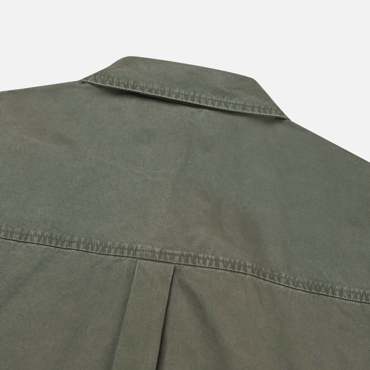 Three-snap cuff detail on a khaki washed cotton western shirt