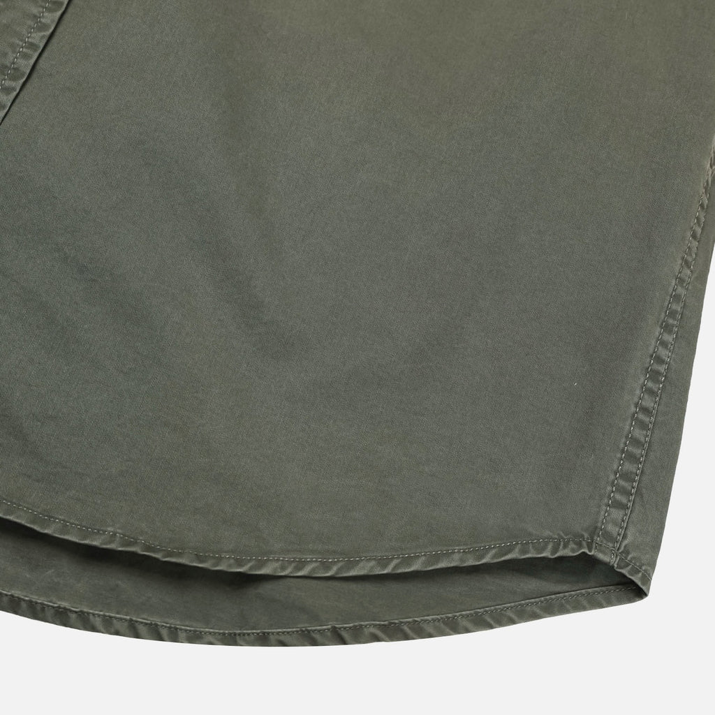 Close-up of khaki 100% cotton fabric with washed finish