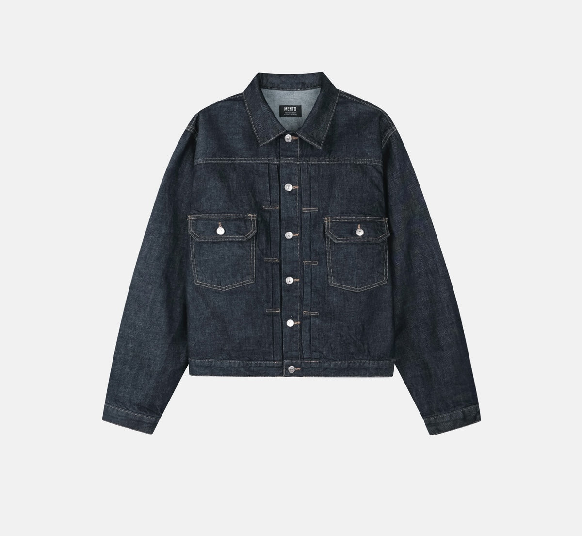 Buttoned cuff and contrast stitching on a raw indigo cotton denim jacket