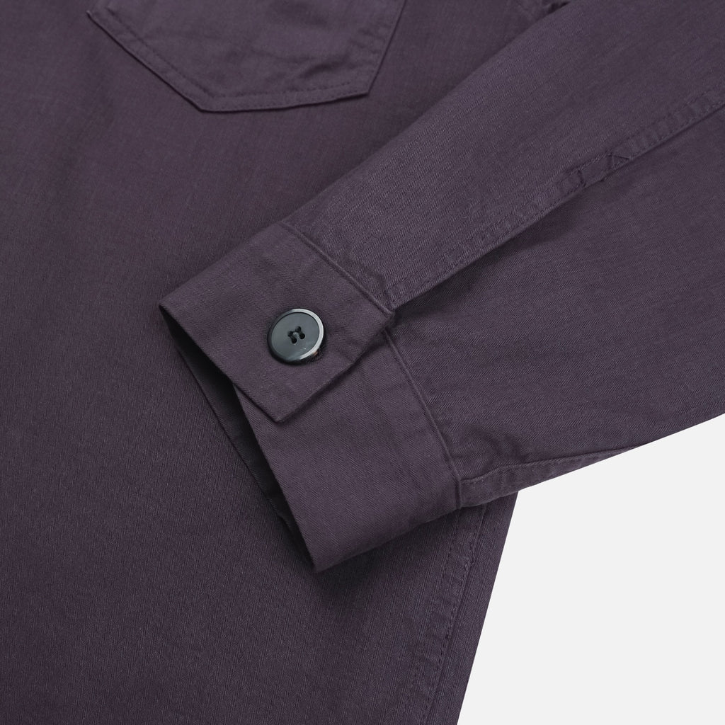 Black men's herringbone cotton shirt jacket styled over a white T-shirt