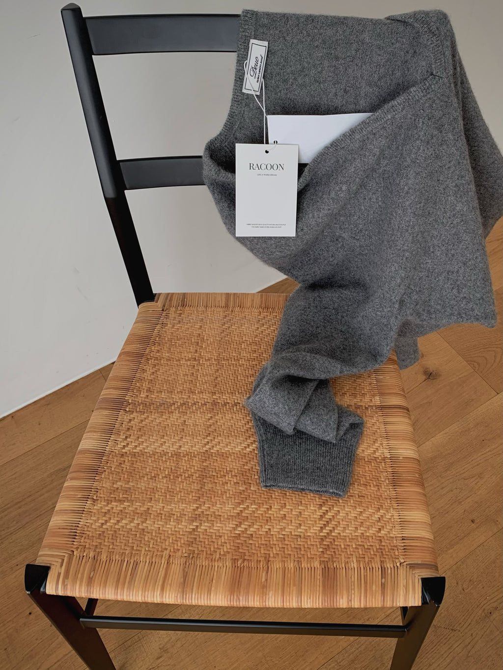 V-Neck Racoon Knit Sweater Grey sitting