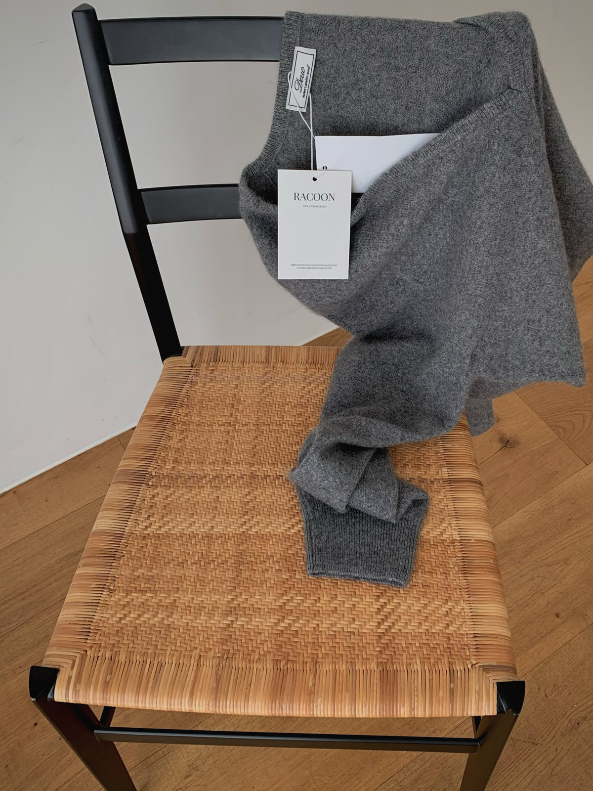 V-Neck Racoon Knit Sweater Grey sitting