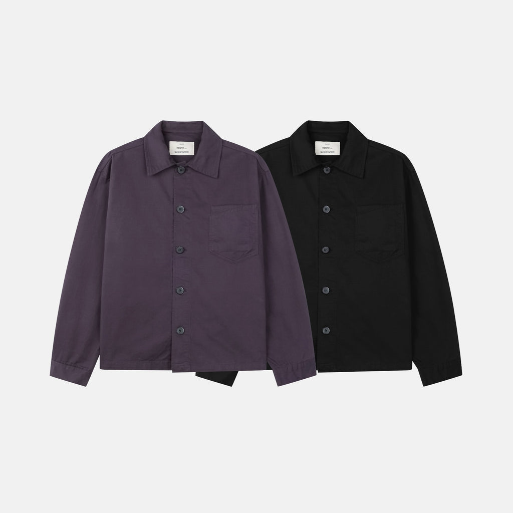 Buttoned cuff detail on a purple herringbone cotton shirt jacket