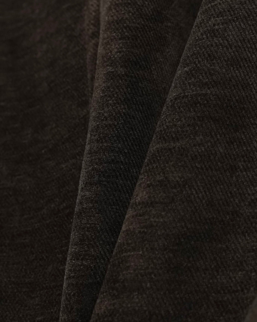 Close-up of brown velvet fabric texture